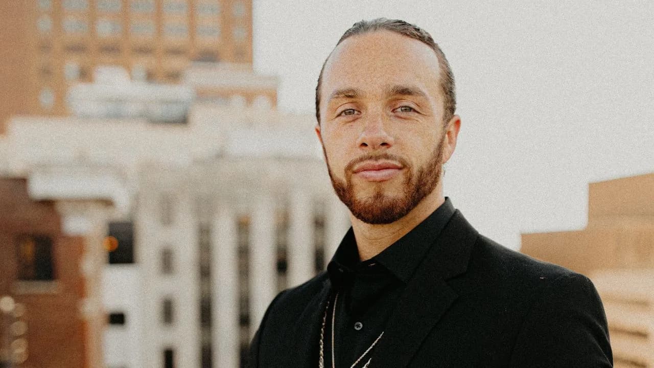 Rudy Perez Jr. in a black suit